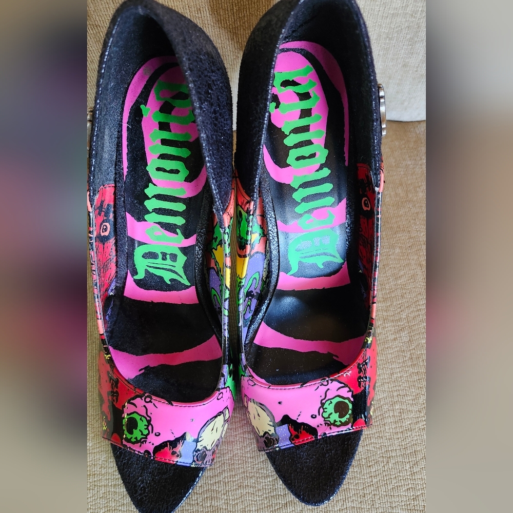 Demonia Pink and Black Heels with Bold Design